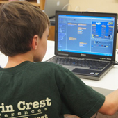 Ignite Creative Learning classroom photograph 2 of 8 showing students and an instructor working at computers.