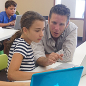 Ignite Creative Learning classroom photograph 4 of 8 showing students and an instructor working at computers.