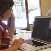Ignite Creative Learning classroom photograph 7 of 8 showing students and an instructor working at computers.